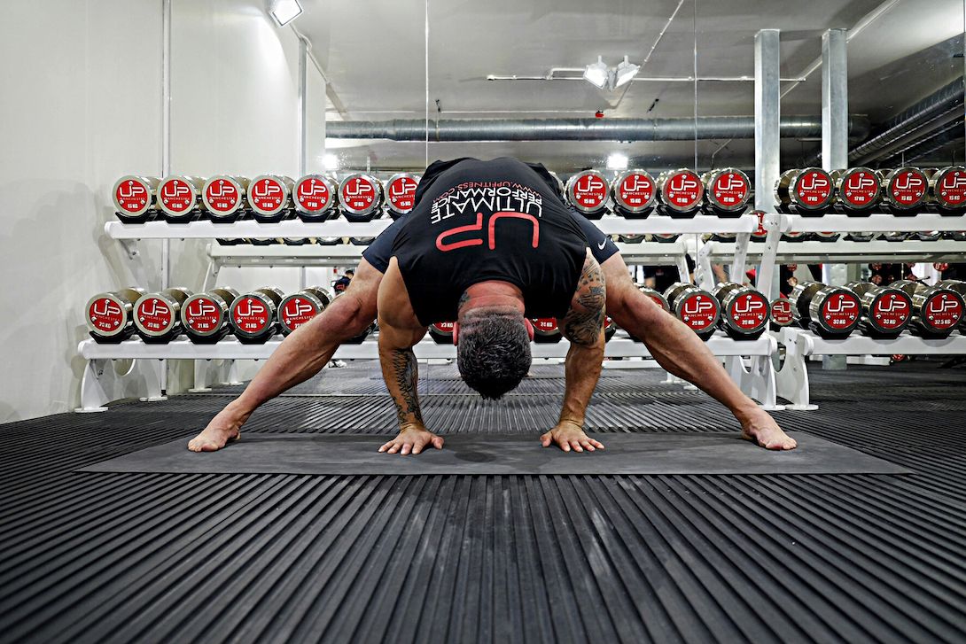 Nick Mitchell: Should I Stretch Before or After Weight Training?